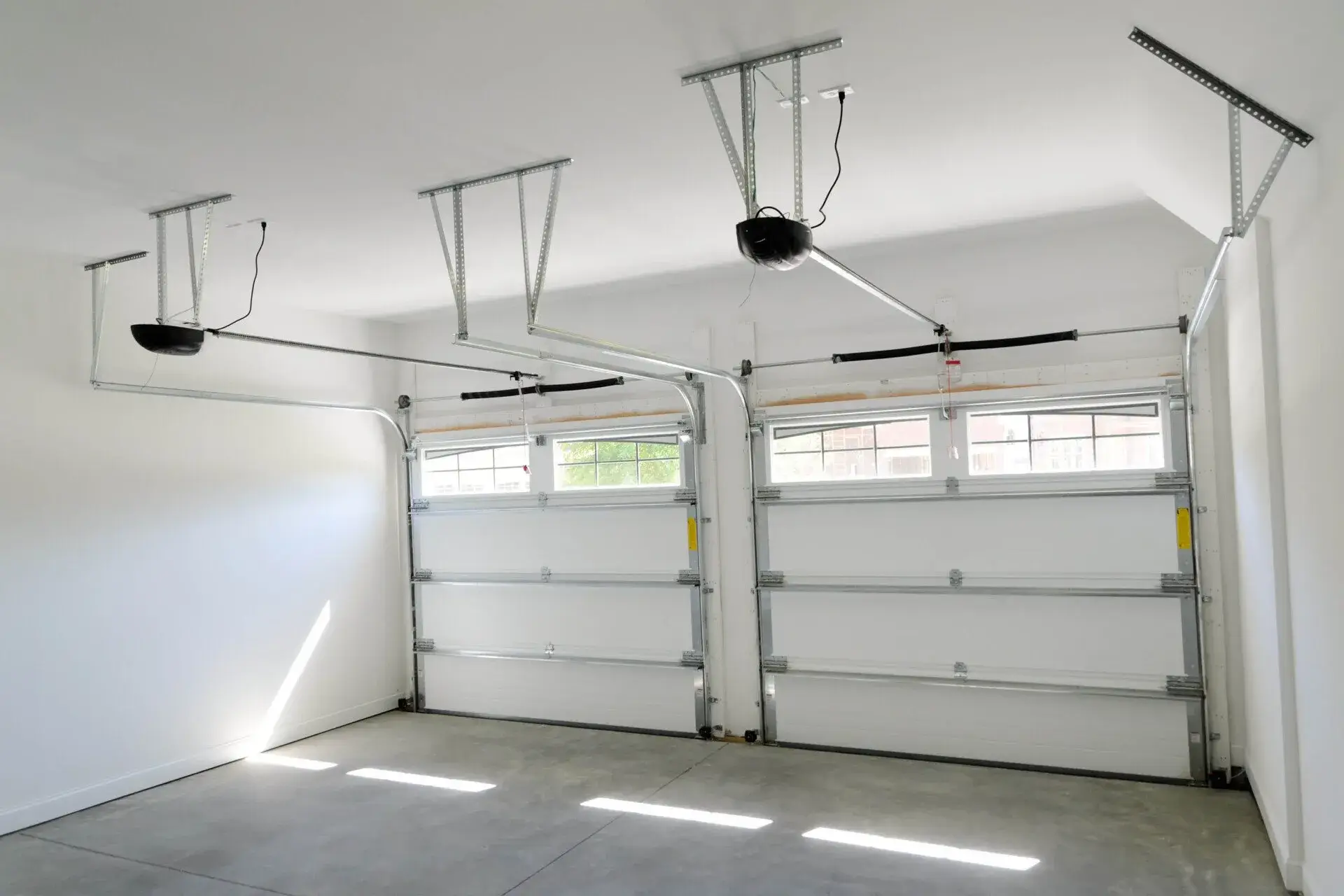 New garage doors installed inside a Glendale garage