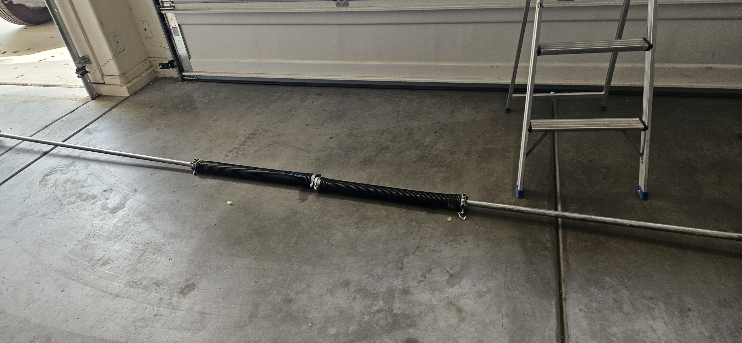 Garage door torsion spring and repair hardware
