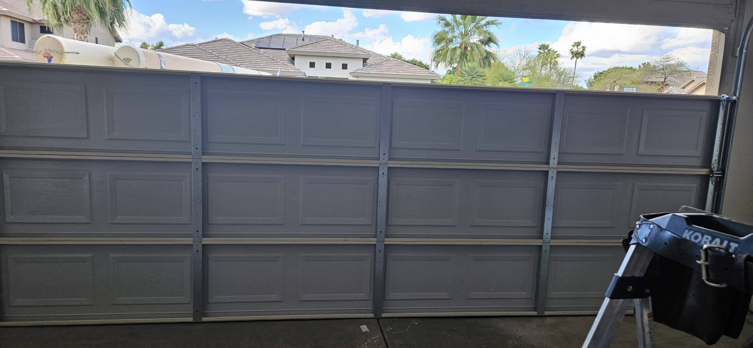 Garage door repair and replacement work from inside a garage