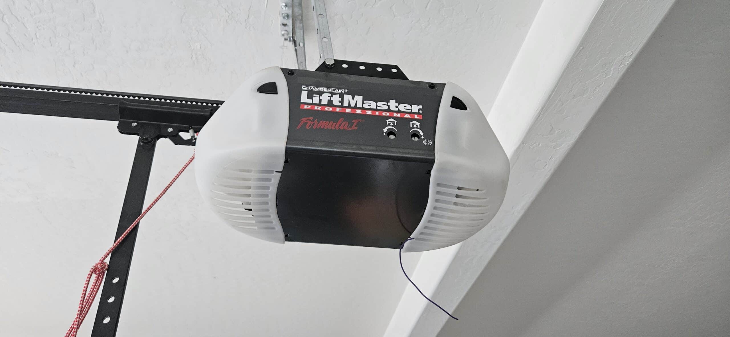 LiftMaster garage door opener installed above a garage door