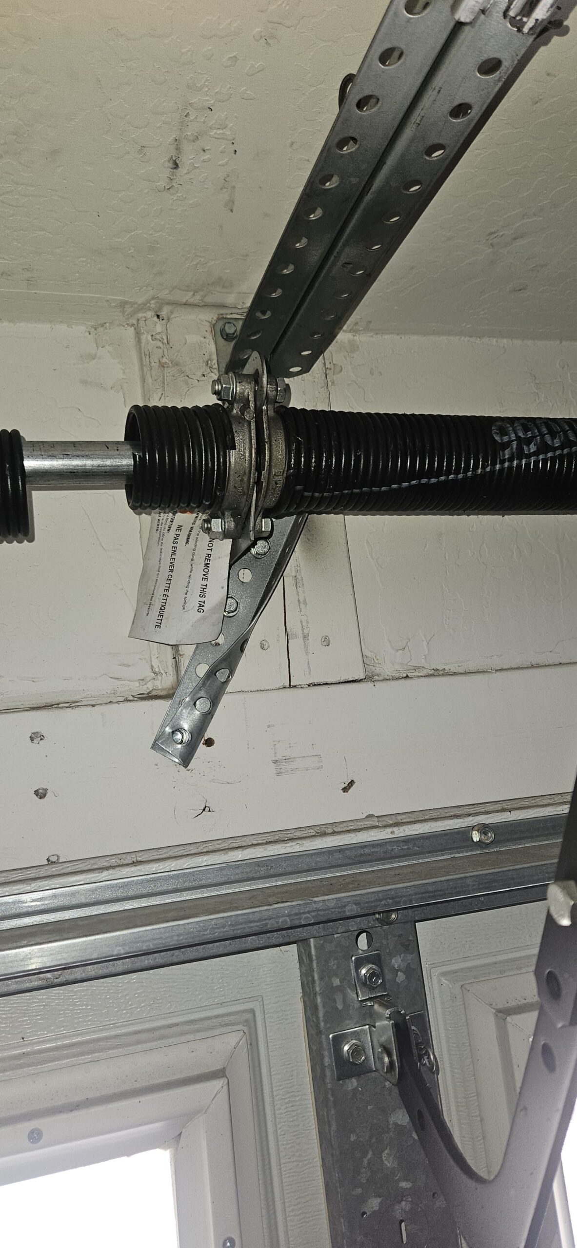 Garage door bracket replacement project in Ocotillo Glendale Arizona