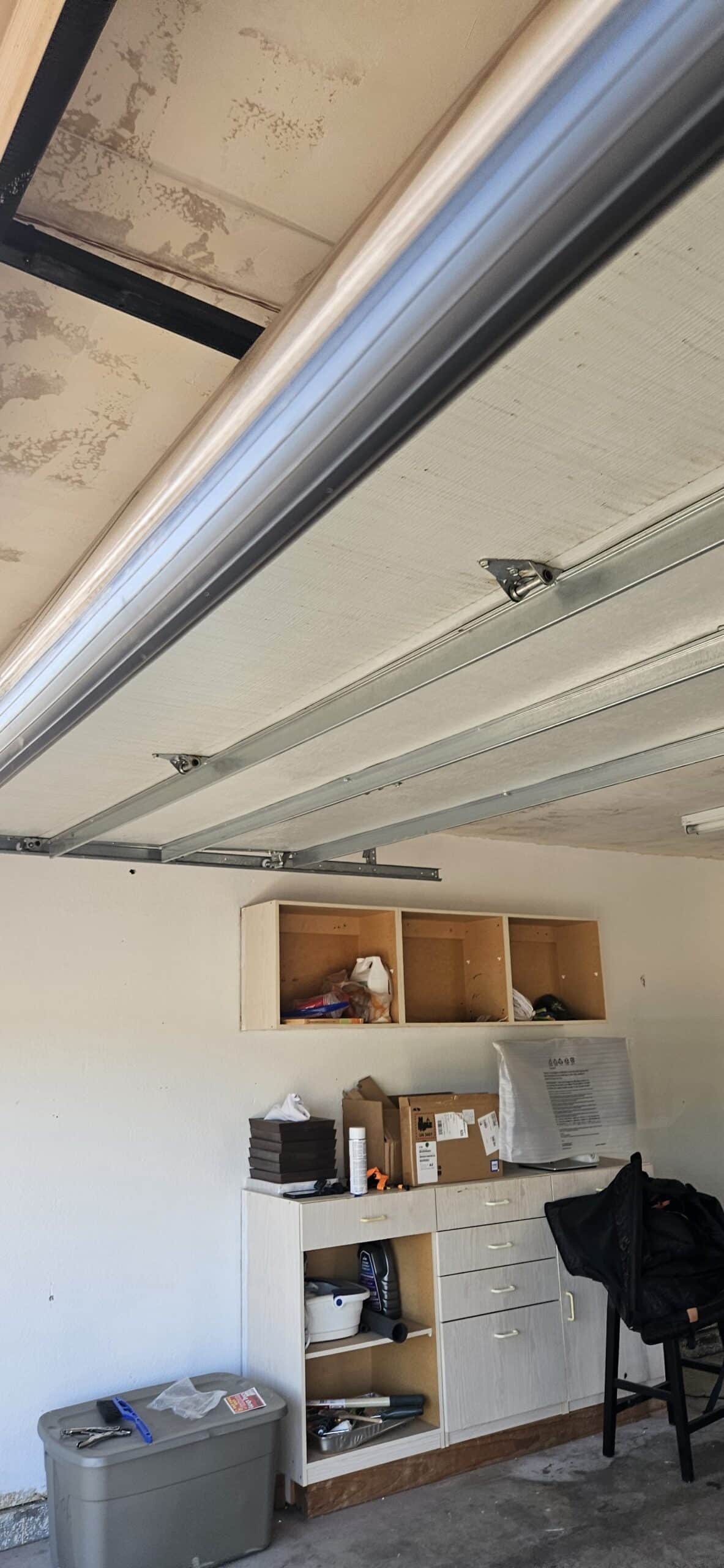 Garage door after roller cable and bottom seal repair in North Mountain Phoenix