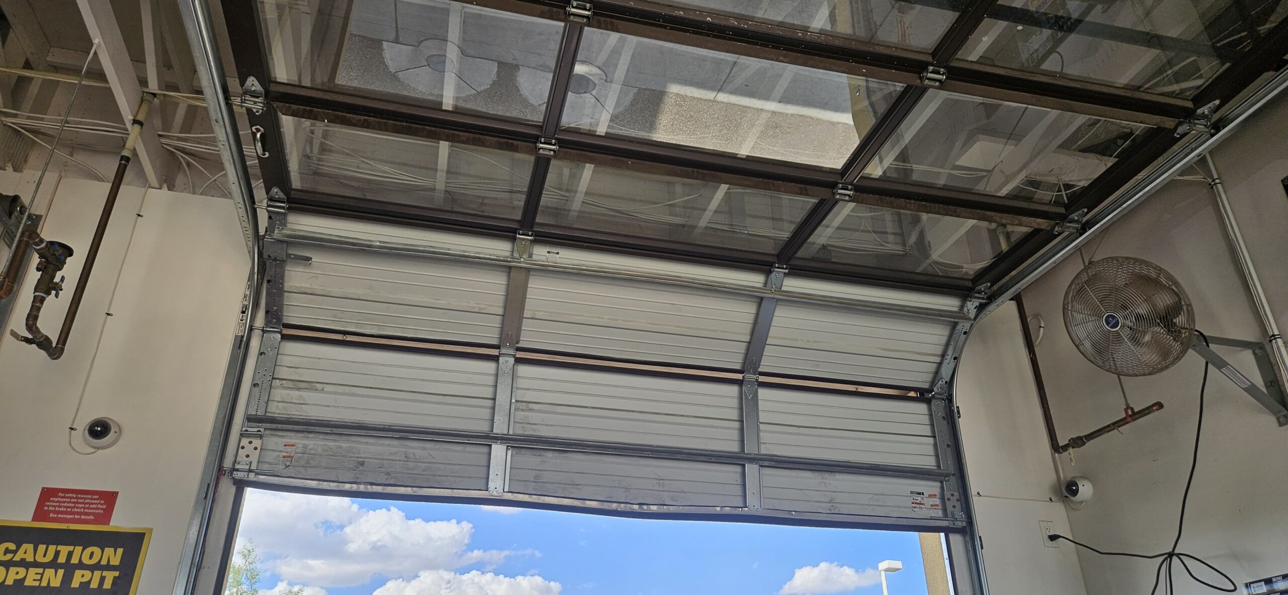 Repaired commercial garage door at a Glendale property